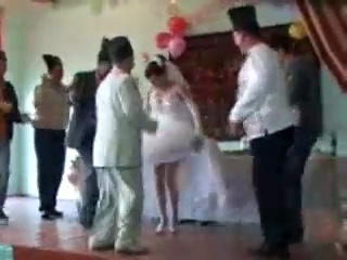 bride flashes at the wedding